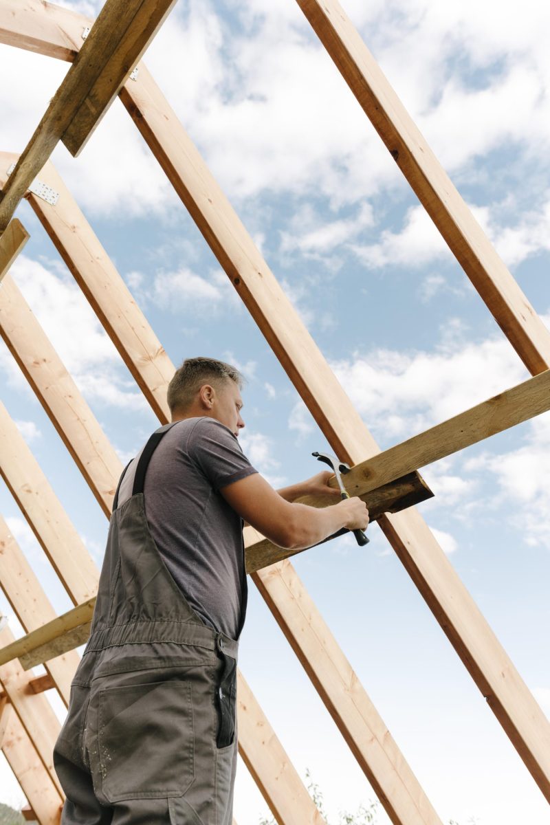 construction-worker-building-roof-house